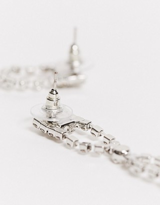 True Decadence crystal statement drop earrings in silver