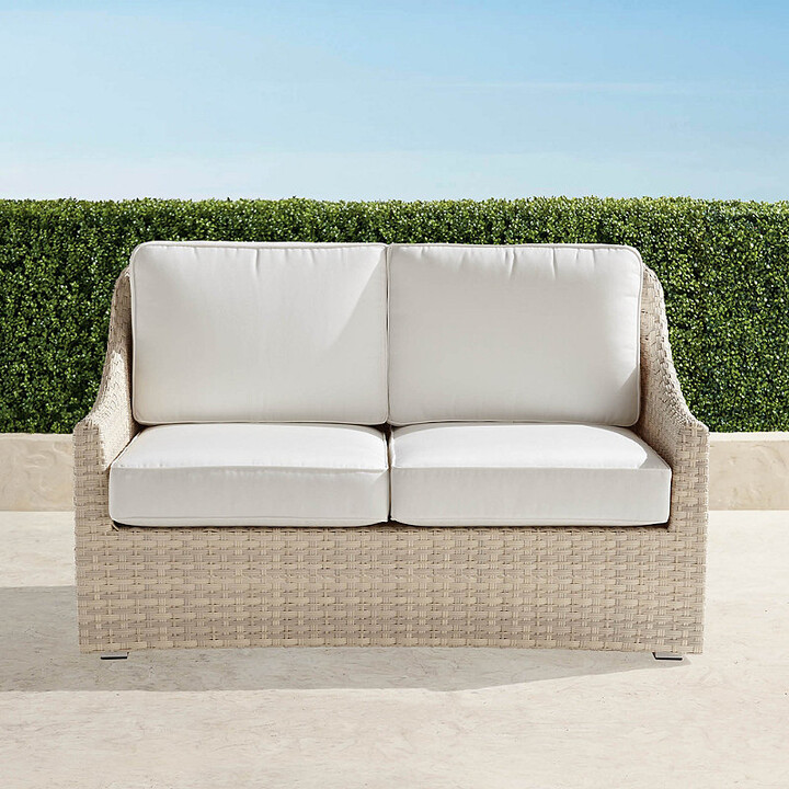 Frontgate Ashby Loveseat with Cushions in Shell Wicker
