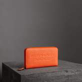 Thumbnail for your product : Burberry Embossed Leather Ziparound Wallet