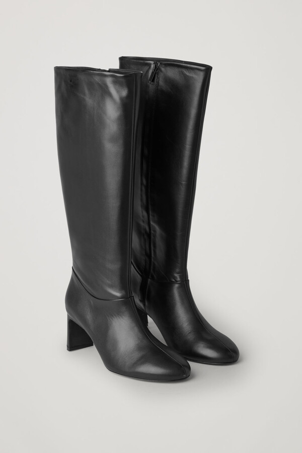 heeled knee high leather boots
