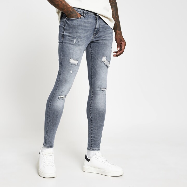 River Island Mens Blue ripped spray on skinny fit jeans - ShopStyle