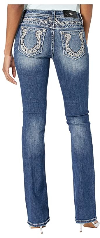 jeans with a horseshoe on the pocket