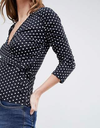 ASOS Design Wrap Top With Tie Side And Ruched Sleeve Detail In Spot Print