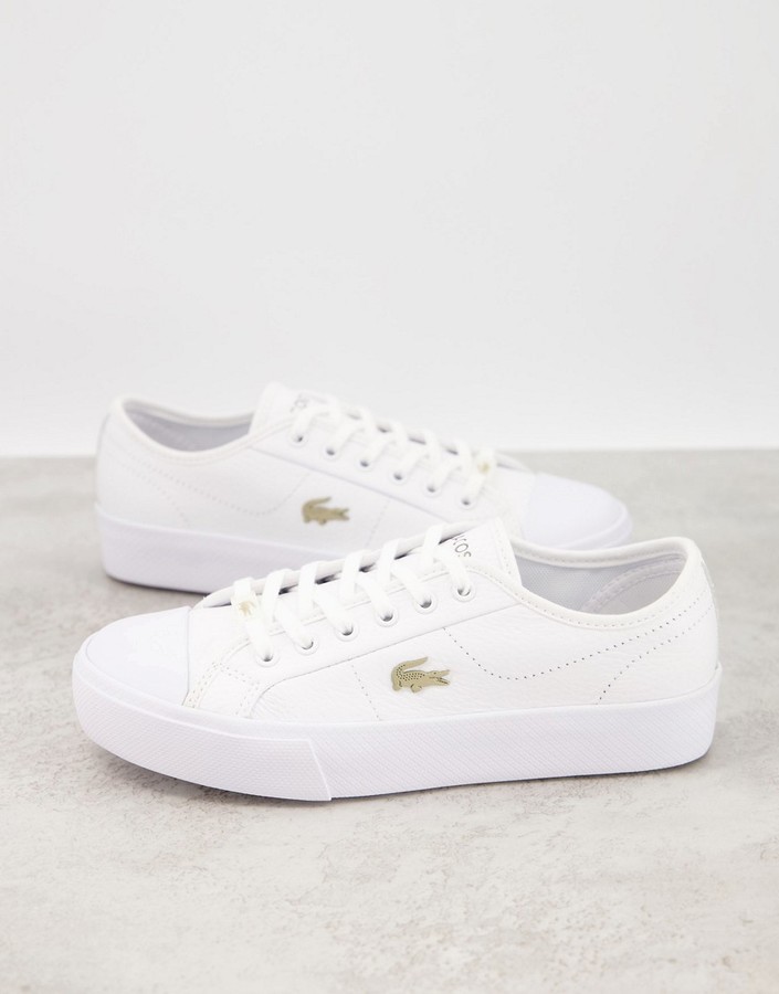Lacoste Ziane Grand flatform sneakers in white with gold badge - ShopStyle