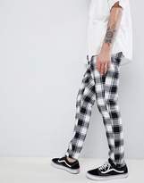 Thumbnail for your product : ASOS Design DESIGN Tall tapered pants in monochrome flannel check