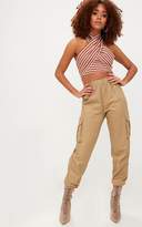 Thumbnail for your product : PrettyLittleThing Bronze Stripe Bandeau Bow Front Multiway Crop Top