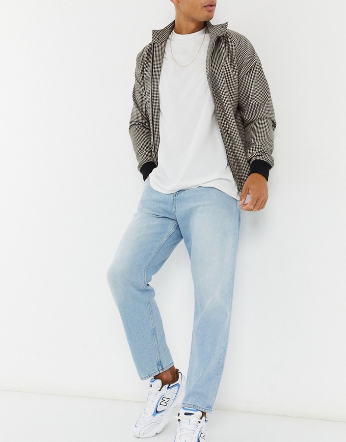 ASOS DESIGN relaxed tapered jeans in vintage light blue stone wash -  ShopStyle