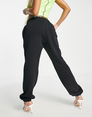 nike mini swoosh oversized joggers womens