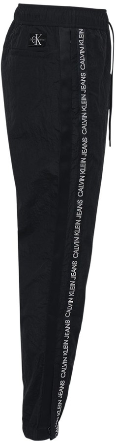 Calvin Klein Jeans Logo Band Nylon Track Pants - ShopStyle