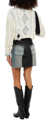 Amiri Denim-paneled studded leather mini skirt