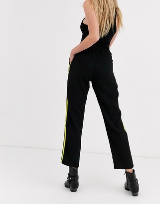 Religion relaxed trousers with contrast side stripe
