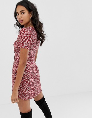 Motel wrap dress with button front in ditsy floral