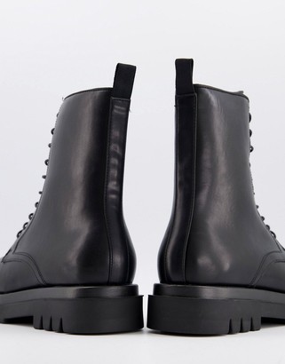 Truffle Collection wide fit lace up chunky military boots in black