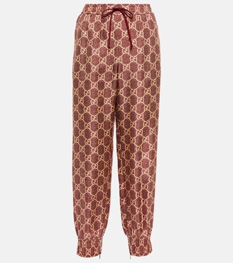 Gucci GG Supreme printed silk sweatpants - ShopStyle Trousers