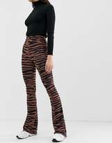 Thumbnail for your product : ASOS Tall DESIGN Tall flare leggings in dark tiger print-Multi