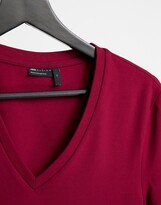 Thumbnail for your product : ASOS DESIGN muscle fit t-shirt with deep v neck in burgundy