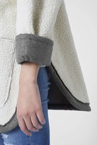 Thumbnail for your product : Topshop Oversized Faux Fur Cape Jacket