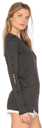 Central Park West Cambridge Lace Up Bell Sleeve Sweater