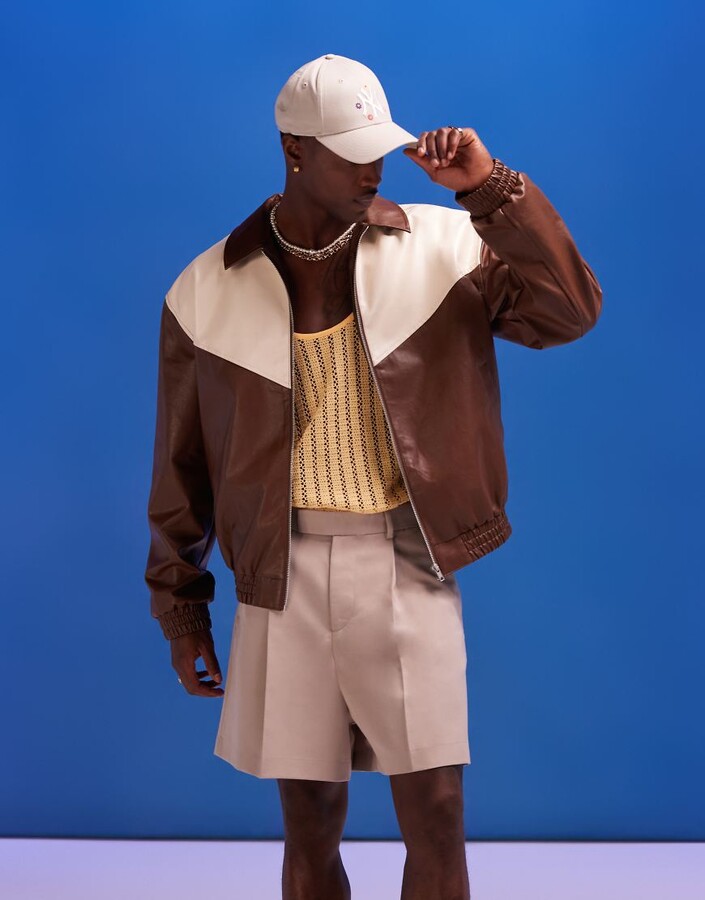 ASOS DESIGN oversized faux leather bomber jacket with cut and sew