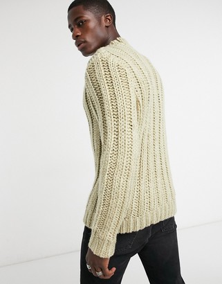 ASOS DESIGN heavyweight hand knit look turtle jumper in beige