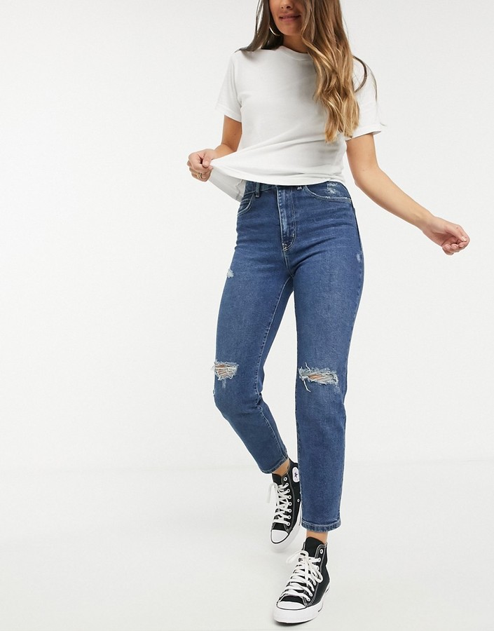 Stradivarius slim mom jeans with stretch and rip detail in medium -