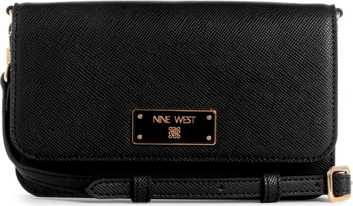 Nine West black saddle crossbody purse sz medium faux Leather - $5 - From  Pinkiosk