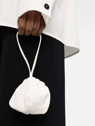 Jil Sander mini Ripple pouch - ShopStyle Clutches