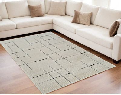 Orren Ellis 5' X 8' Cream and Green Abstract Distressed Area Rug