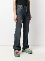 Thumbnail for your product : Off-White Hands-Off distressed jeans