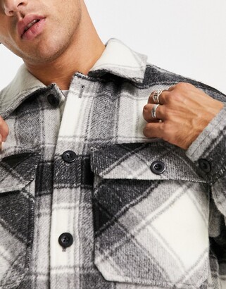 Bershka faux wool check shirt jacket in black/white ShopStyle
