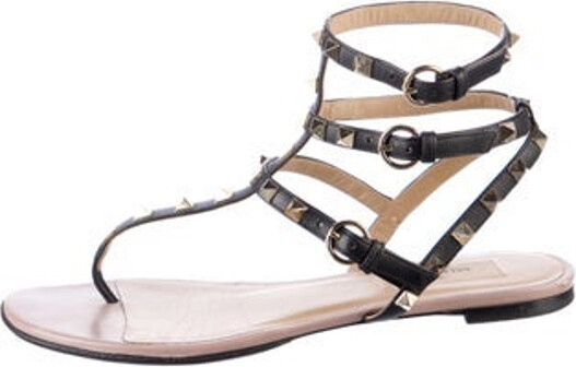 Valentino Leather Gladiator Sandals Black Rockstud Accents Studded Accents Multistrap & Buckle Closure at Ankles Unfortunately, due to restrictions, this item may not be eligible for shipping in all areas.