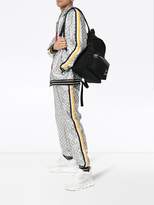 Thumbnail for your product : Gucci laminated sparkling GG jacket