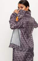 Thumbnail for your product : PrettyLittleThing PLT Brown Printed Panel Shell Suit Jacket