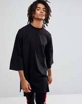 Thumbnail for your product : ASOS DESIGN extreme oversized super longline t-shirt with side splits in black
