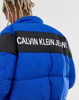 Thumbnail for your product : Calvin Klein Jeans puffer jacket in blue with chest stripe