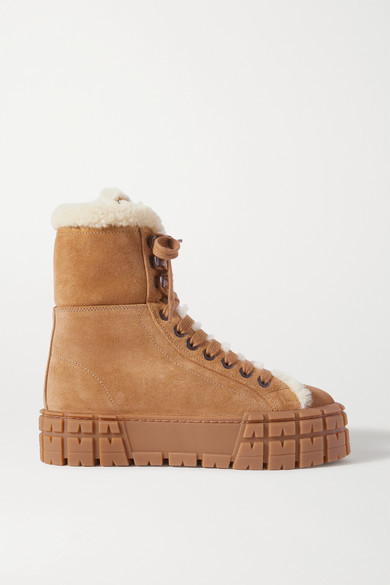 prada fur lined boots