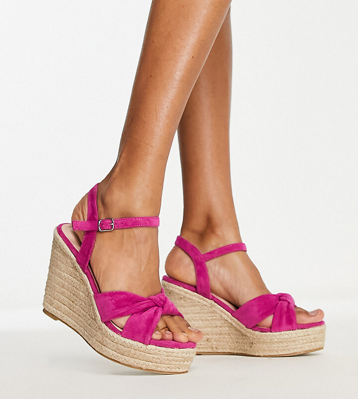 Wedge sandals casual resort attire for women.