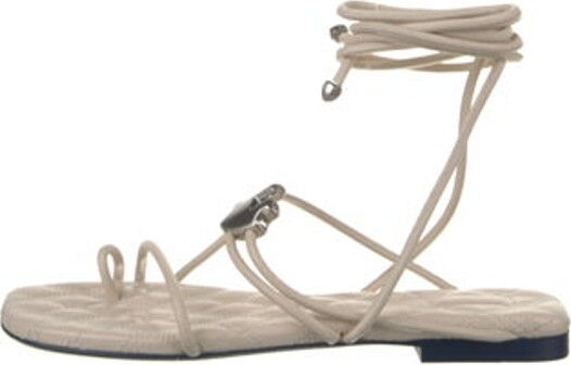 Burberry Leather Sandals Neutrals Wrap-Around Straps Includes Box & Dust Bag Unfortunately, due to restrictions, this item may not be eligible for shipping in all areas.