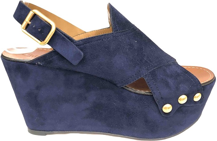 blue suede clogs