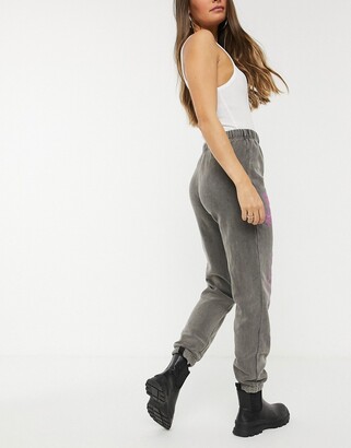 New Girl Order relaxed joggers with lightning print in vintage wash co-ord