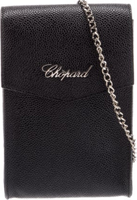Chopard Evening Bag Black Leather Graphic Print Silver-Tone Hardware Chain-Link Shoulder Strap Leather Lining & Single Interior Pocket Snap Closure at Front Includes Dust Bag Unfortunately, due to restrictions, this item may not be eligible for shipping in all areas.
