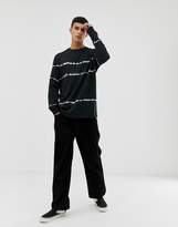 Thumbnail for your product : ASOS Design DESIGN relaxed longline long sleeve t-shirt with ripple tie dye wash in black