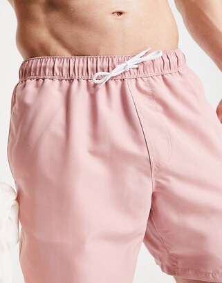 ASOS DESIGN swim shorts in pink mid length