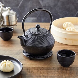https://img.shopstyle-cdn.com/sim/51/aa/51aaf22ffd22bccbc0196d1bdca2f9b7_xlarge/juvale-black-cast-iron-teapot-tea-kettle-set-with-2-cups-contemporary-trivet-dutch-hobnail-1200-ml.jpg