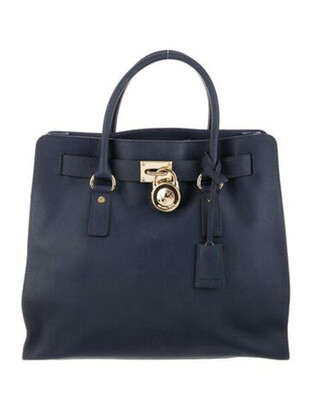 michael kors black tote with gold chain
