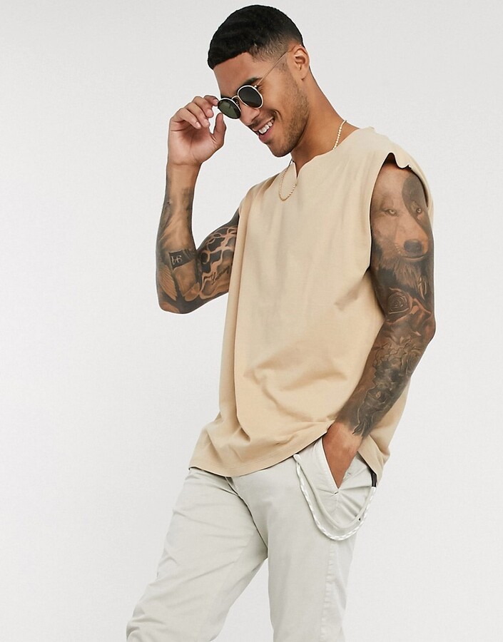 ASOS DESIGN oversized tank top with notch neck in beige - ShopStyle Shirts