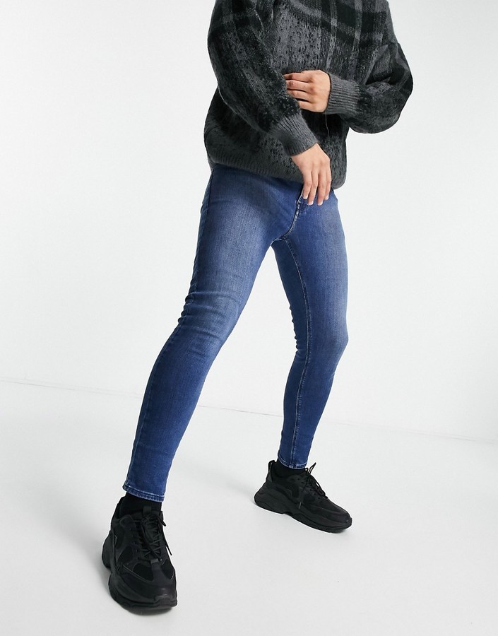 blue ankle grazer trousers