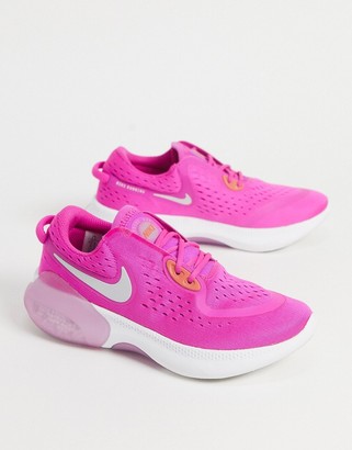 bright pink nike trainers