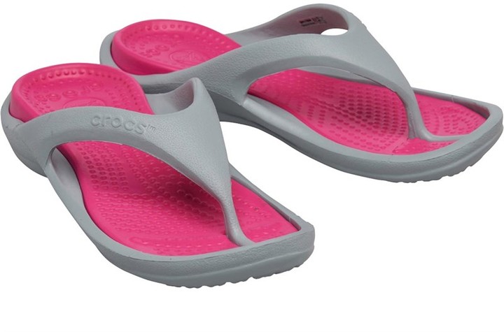 crocs pink flip flops