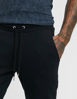 ASOS DESIGN skinny sweatpants with side stripe - ShopStyle